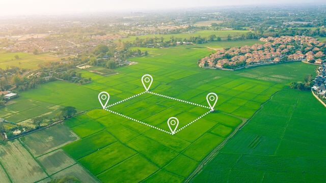 A piece of property with gps markers. The property is outlined in white dash marks.